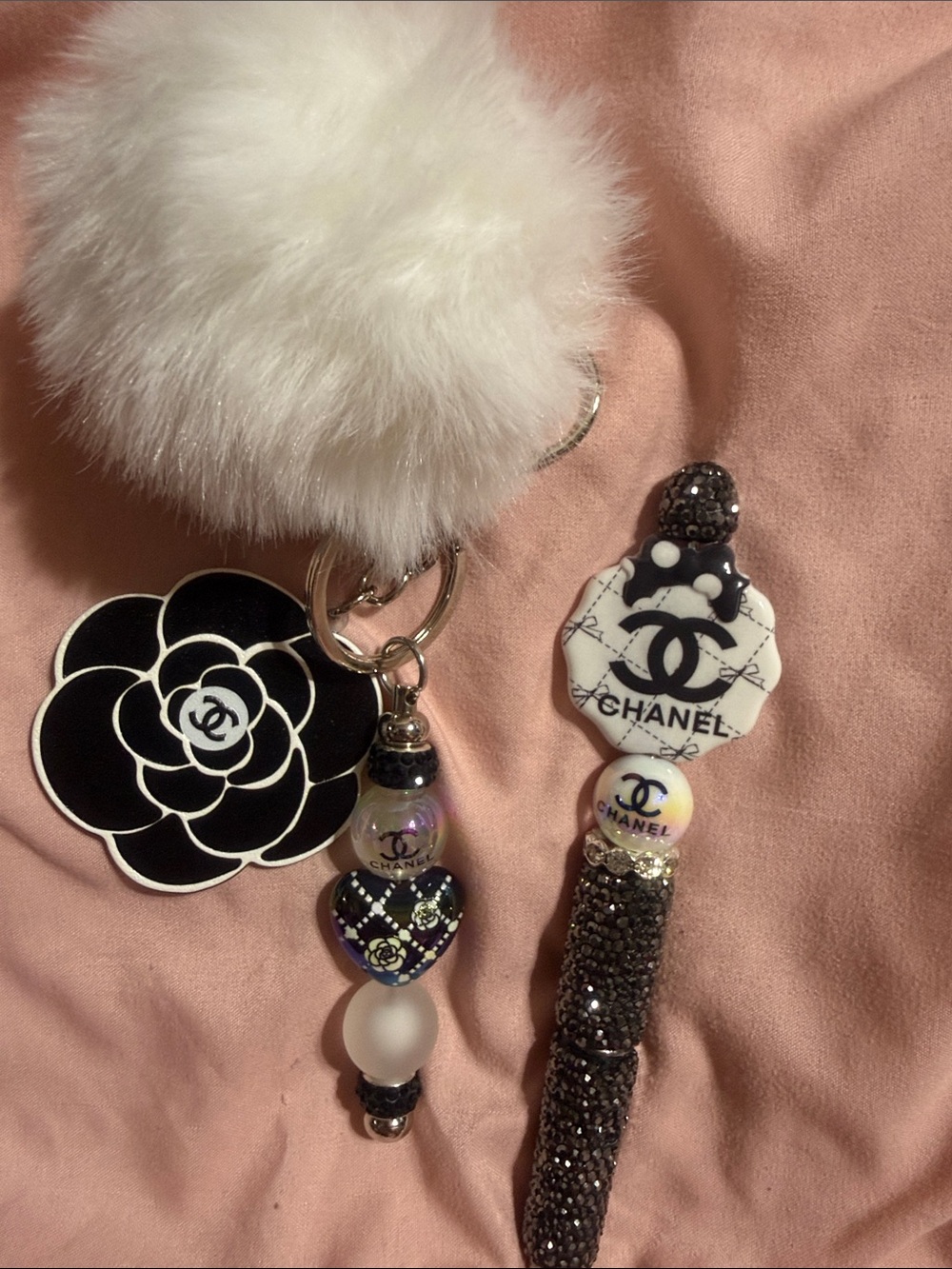 Black & white matching keychain and rhinestone pen with extra pen refill.